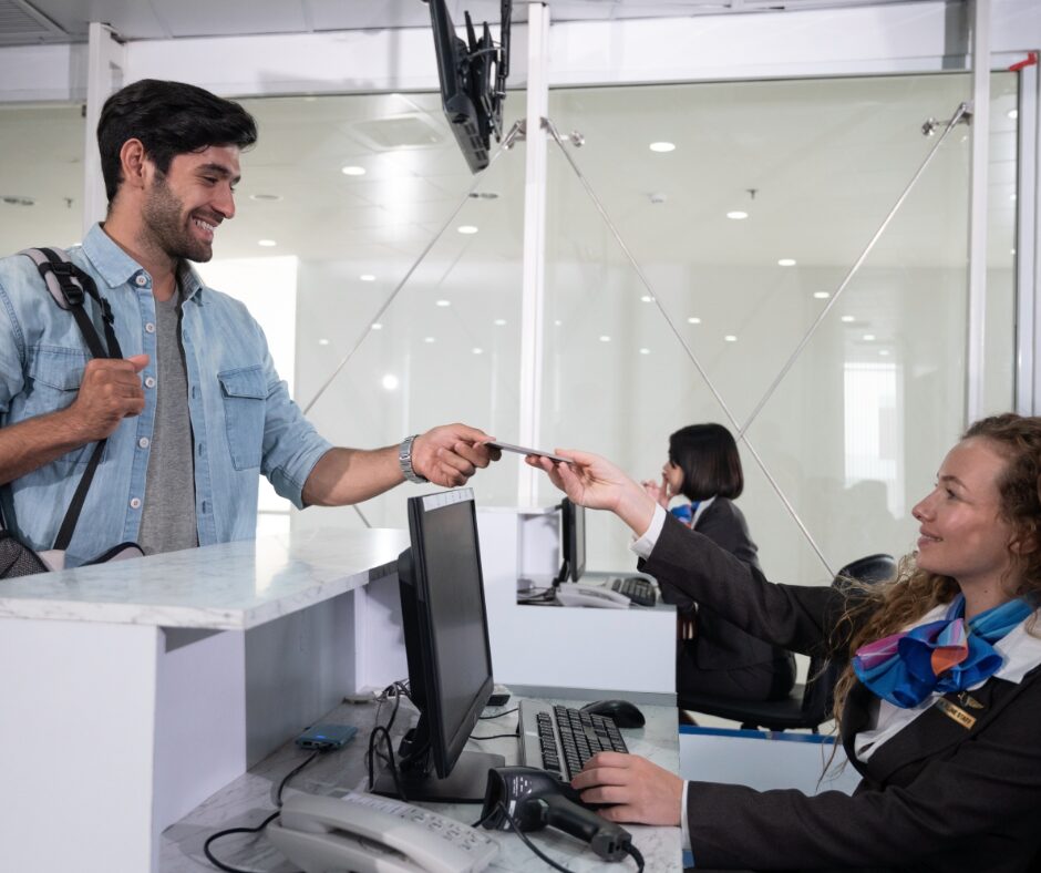 Passenger checking in at an airline counter.