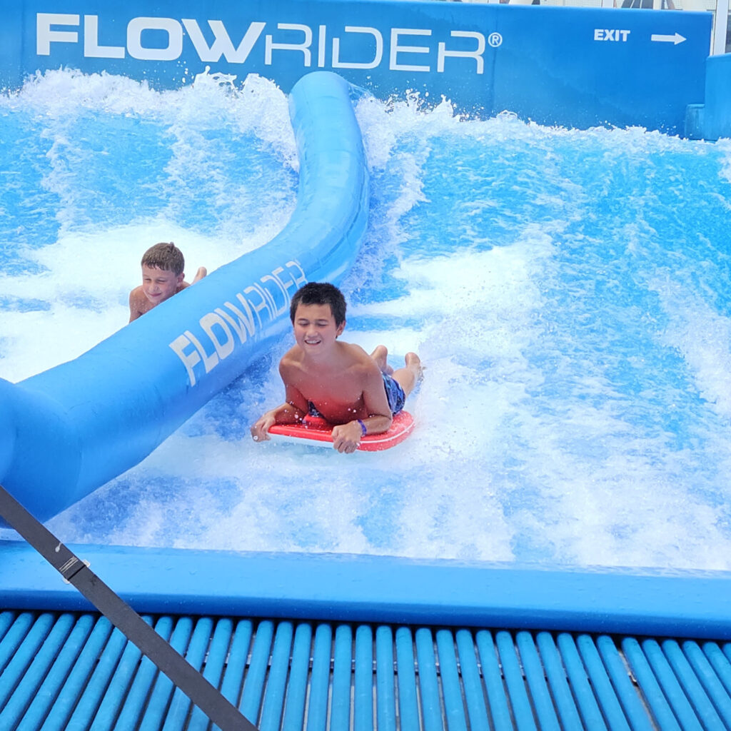 teenage boy on the Flowrider on the Royal Caribbean