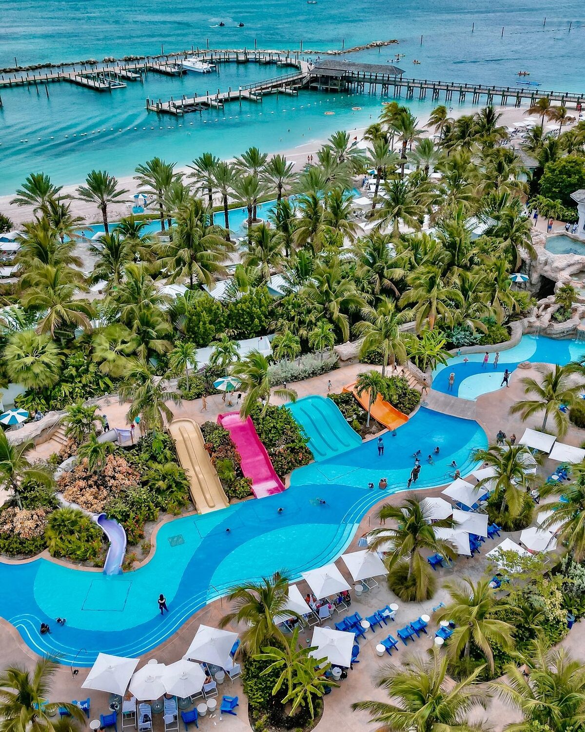 Aerial view of Grand Hyatt Baha Mar pool area with slides.